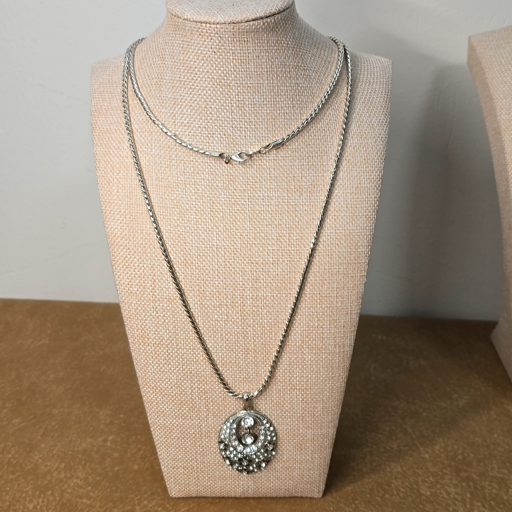 Silver tone pendant